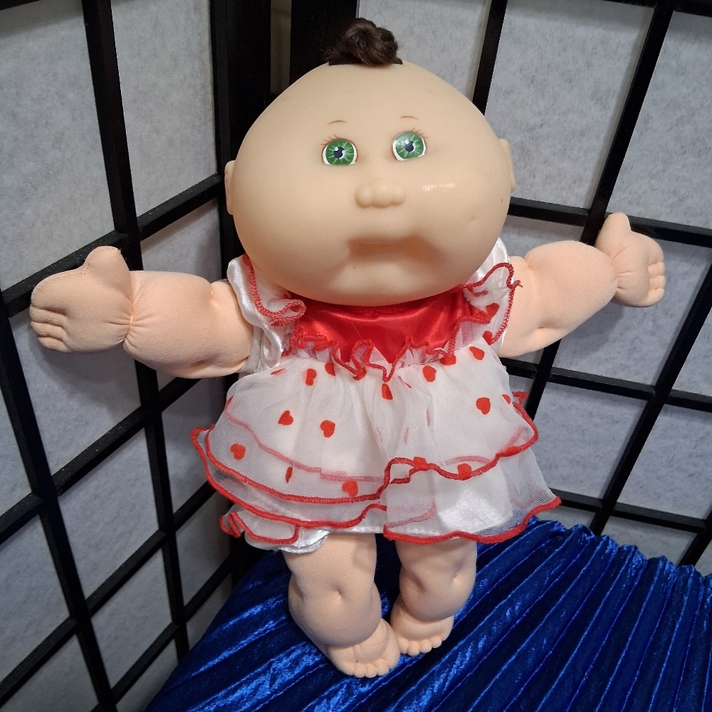 Charming Red and White Doll with Accessories